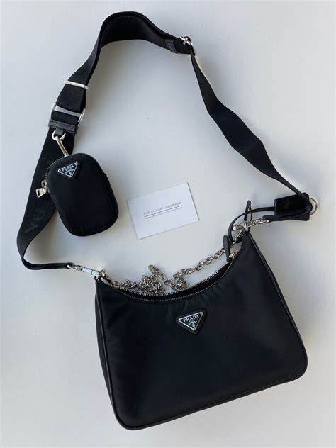 prada cross body bag black.